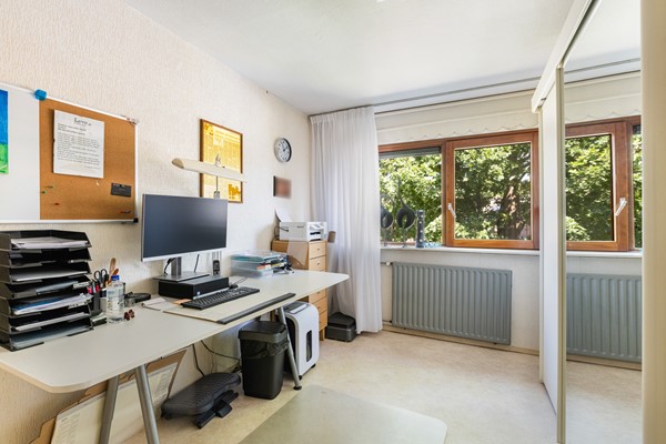 Foto - Te koop: Goed onderhouden tussenwoning in rustige woonwijk!